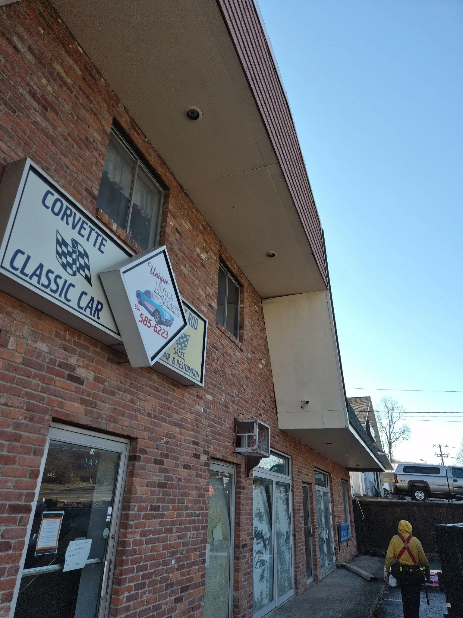 Brick storefront sign fascia exterior painting