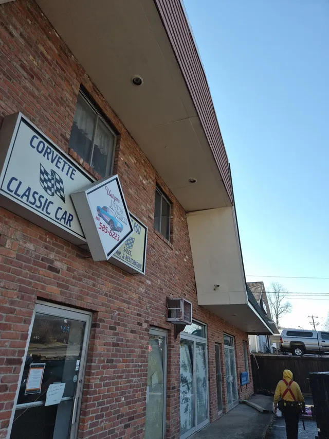 Brick storefront sign fascia exterior painting