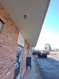 Brick storefront white soffit walkway