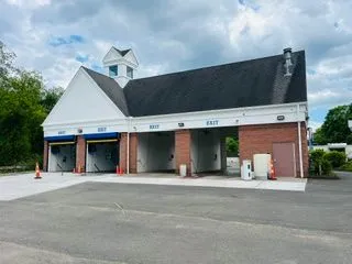 Car wash building exterior after painting front bays