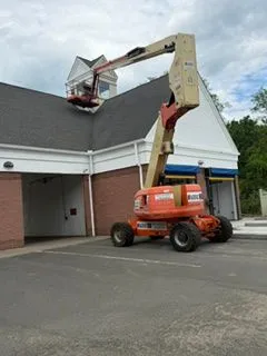Car wash cupola painting with boom lift
