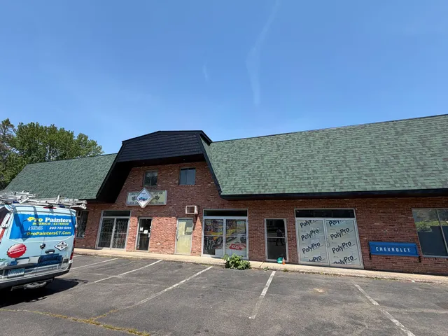 Commercial plaza black mansard after painting