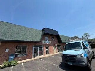 Commercial plaza exterior painting work van