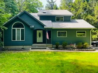 Green house front exterior after painting