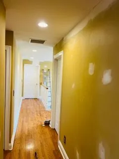 Hallway gold walls patched before painting