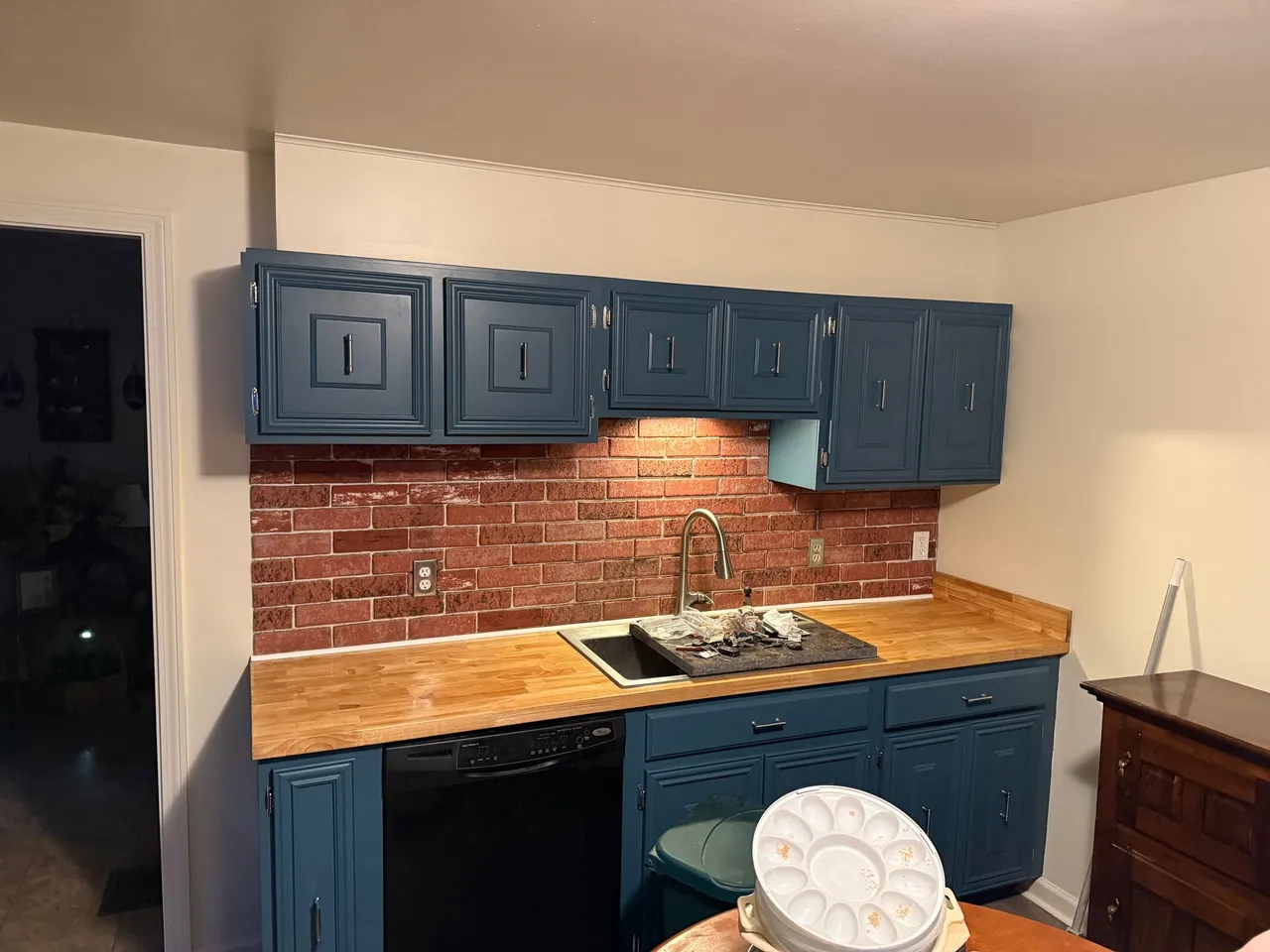 Kitchen cabinets painted blue sink wall butcher block