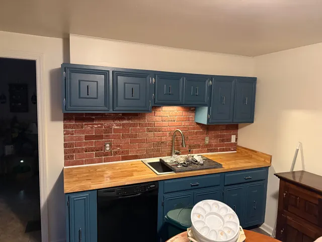 Kitchen cabinets painted blue sink wall butcher block