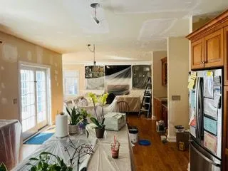 Kitchen ceiling repair furniture covered before painting