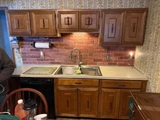 Kitchen oak cabinets sink wall before cabinet painting