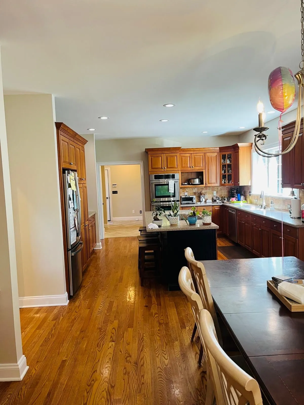 Kitchen wood cabinets repainted white walls