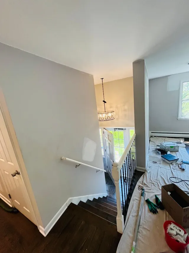 Stairway landing walls painting in progress